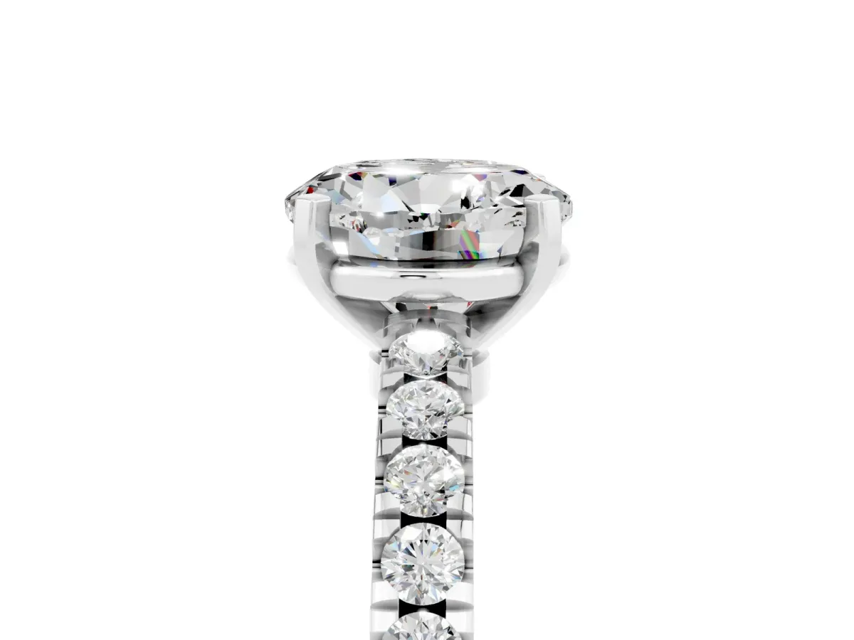 Round Cut Solitaire Moissanite with Pavé Band and Four-Prong Setting Silver
