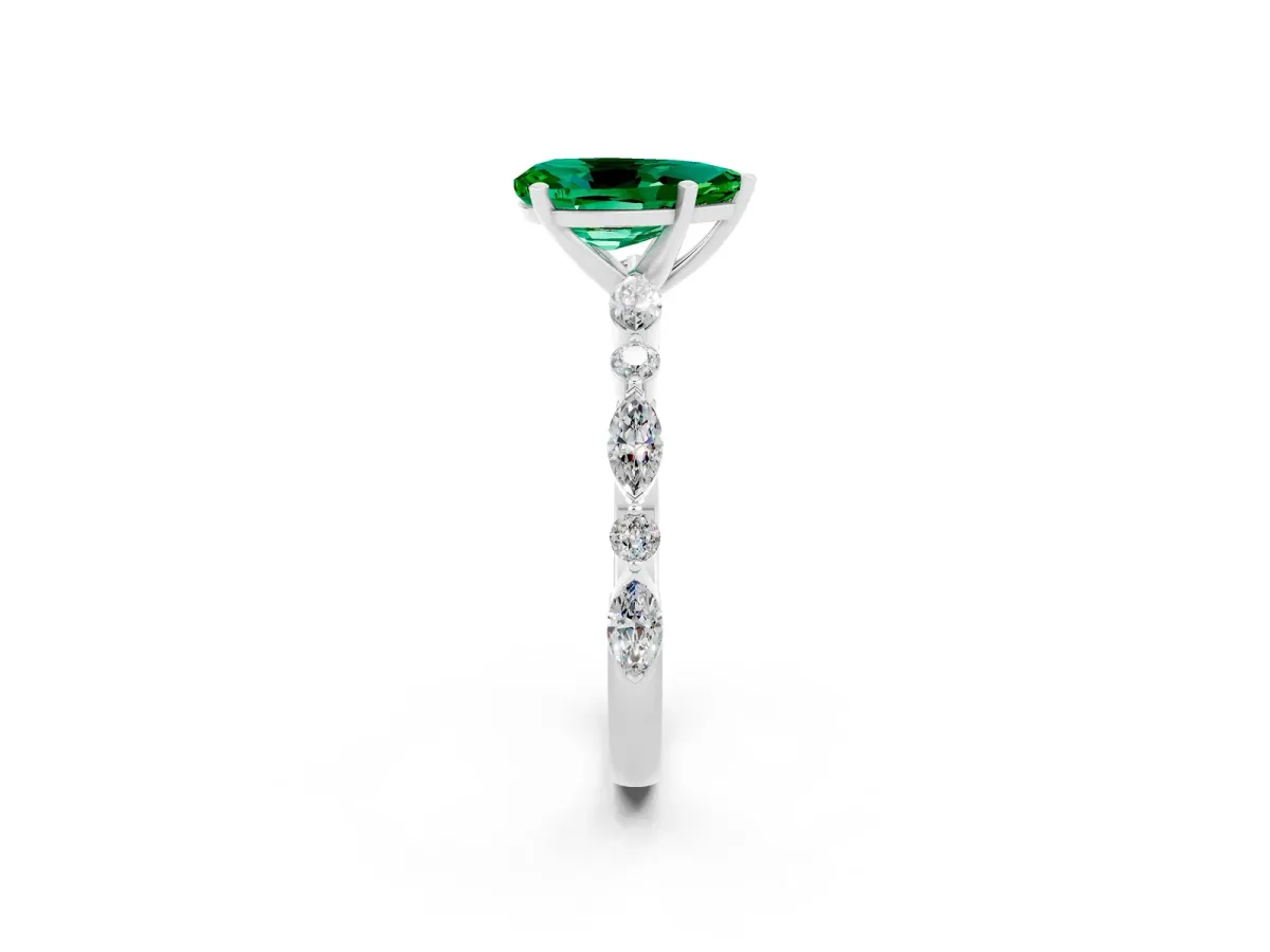 Pear Cut Emerald Ring with Marquise and Round Side Stones and Four-Prong Setting Silver