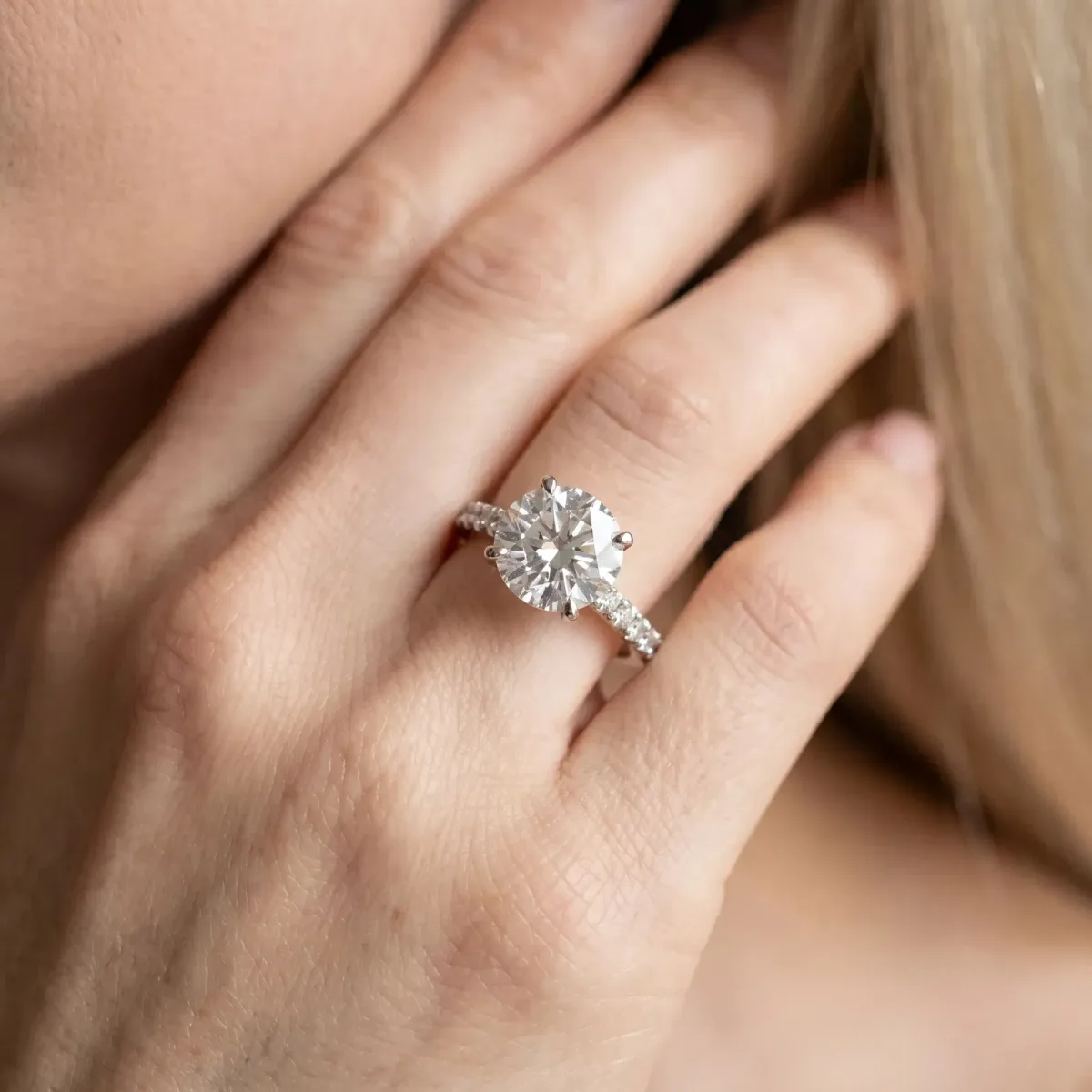 Round Cut Diamond Solitaire Engagement Ring with Round Band and Four-Prong Setting Silver