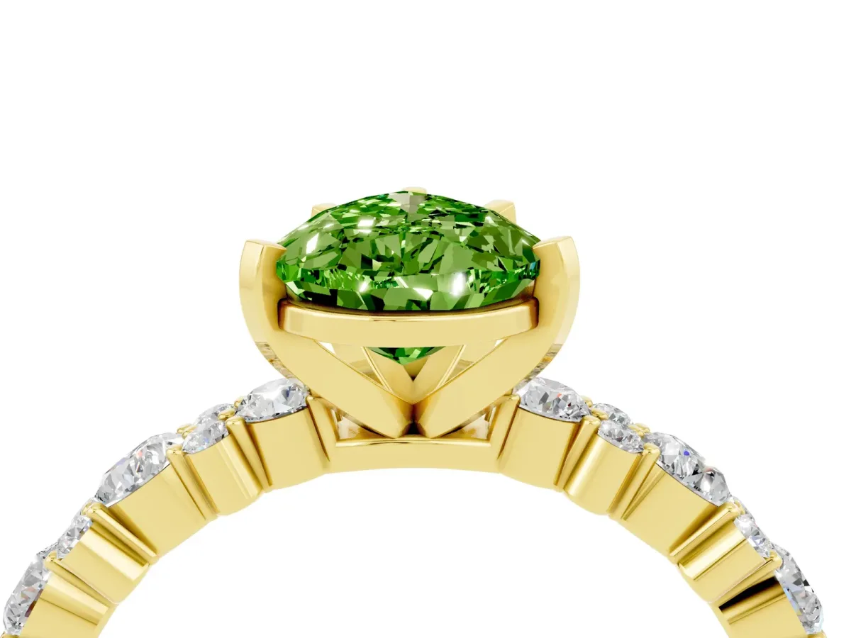 Pear Cut Peridot Side Stone Solitaire Ring with Round and Four-Prong Setting Yellow gold