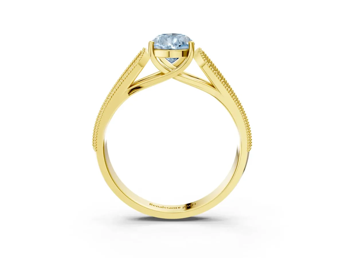 Fancy Blue Pear Cut Cut Pave Split Shank Engagement Ring with Four-Prong Setting Yellow gold