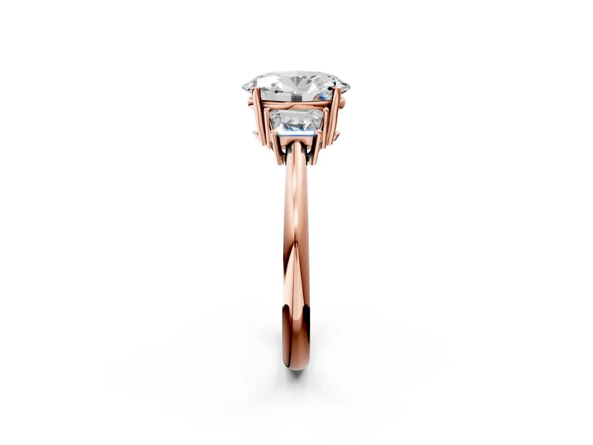 Oval Cut Diamond Three-Stone Ring with Trapezoid Side Stones and Prong Setting Rose gold