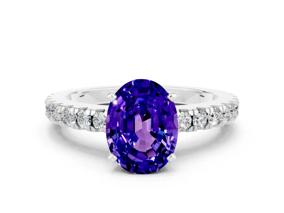 Oval Cut Solitaire Tanzanite with Pavé Band and Four-Prong Setting Silver