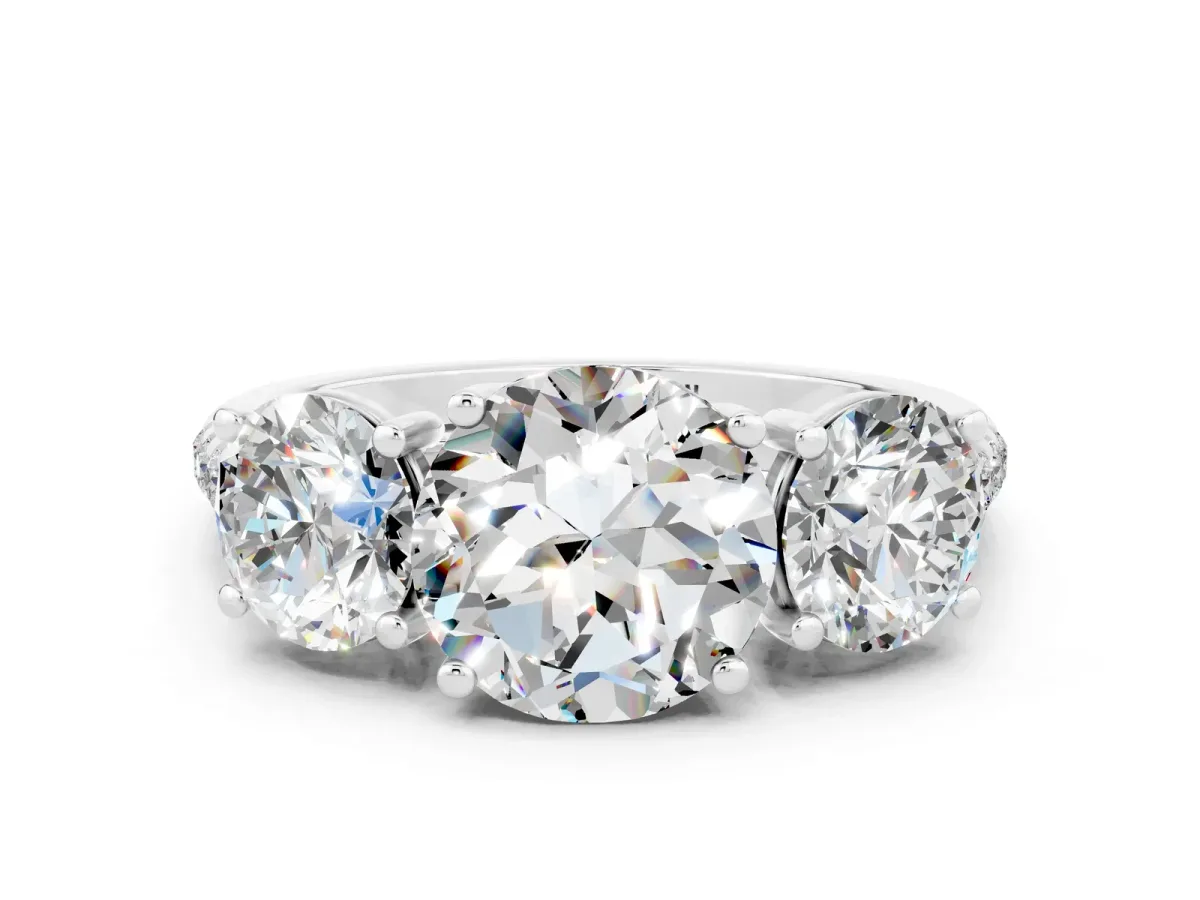 Three-Stone Round Cut Moissanite Ring with Round Pavé Band and Prong Setting Platinum