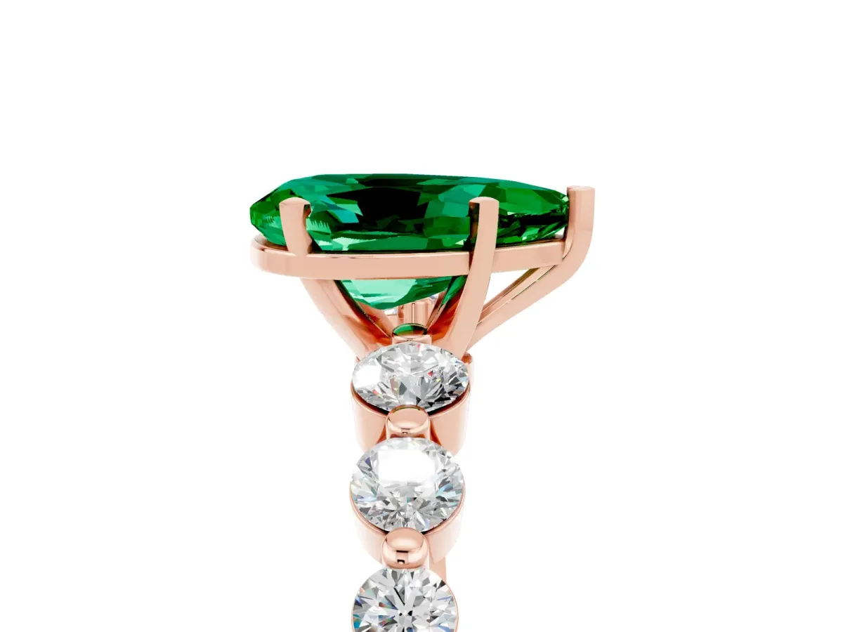 Pear Cut Solitaire Emerald Ring with Pave Band and Four-Prong Setting Rose gold