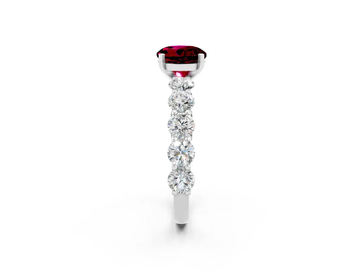 Round Cut Garnet Prong Setting with Side Stones on a Pave Band Platinum