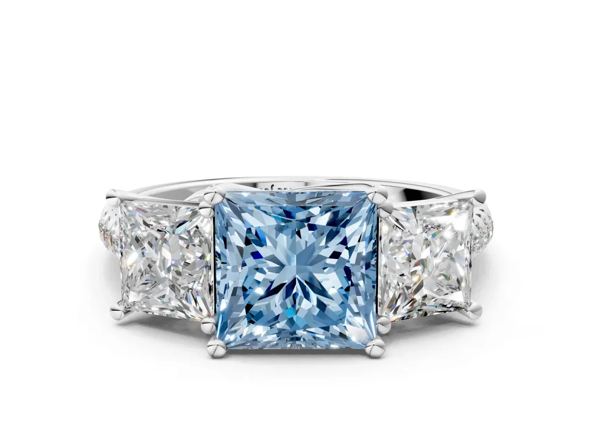 Fancy Blue Three-Stone Princess Cut Diamond Ring with Round Pavé Band and Prong Setting Silver
