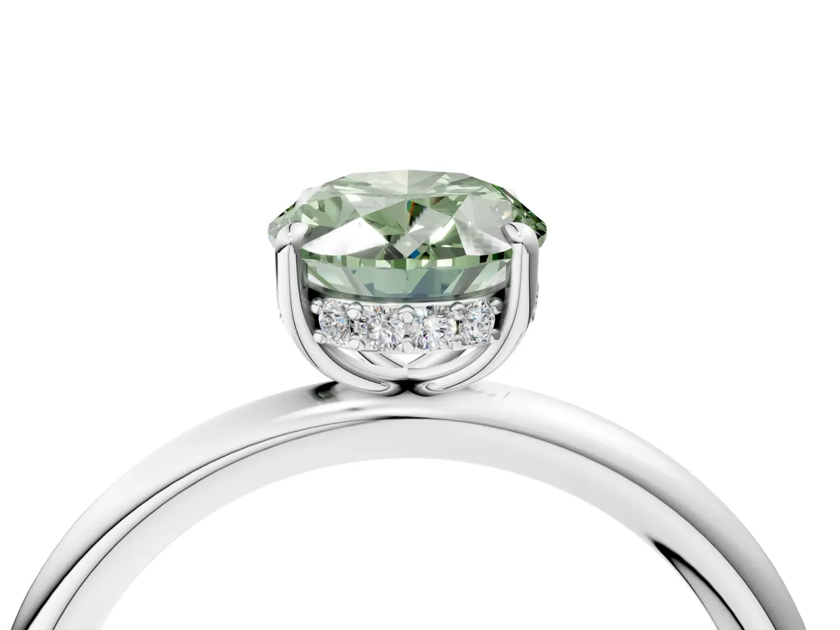 Fancy Green Oval Cut Diamond Solitaire Ring with Thin Band and Four-Prong Setting White gold