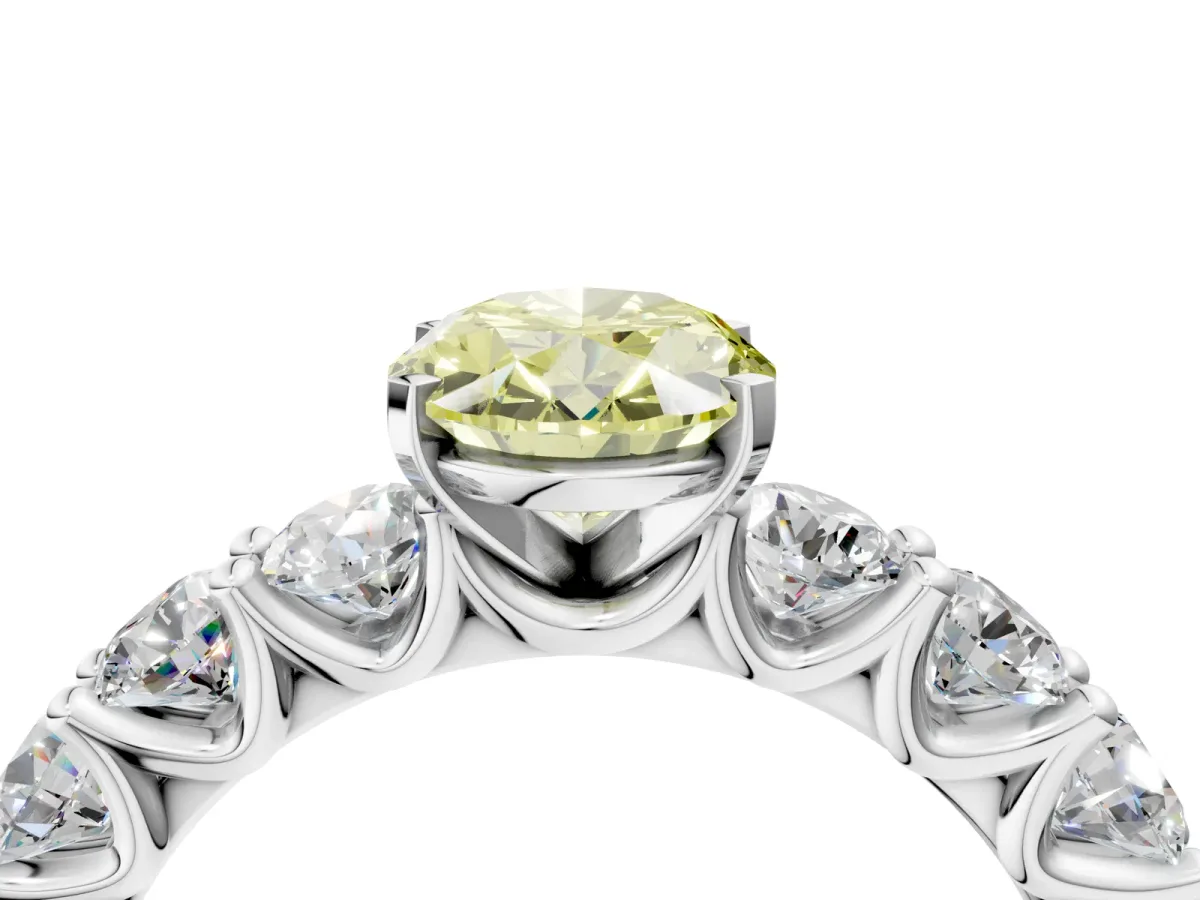 Fancy Yellow Oval Cut Diamond Prong Setting with Side Stones on a Pave Band Platinum