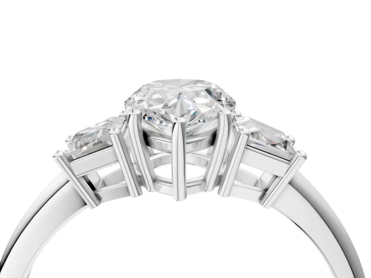 Pear Cut Diamond Three-Stone Ring with Trapezoid Side Stones and Prong Setting White gold