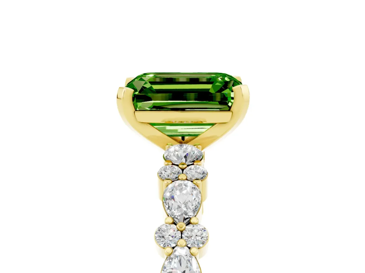 Emerald Cut Peridot Side Stone Solitaire Ring with Round and Four-Prong Setting Yellow gold