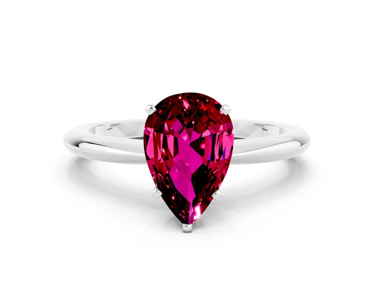Pear Cut Garnet Solitaire Ring with Six-Prong Setting and Classic Band Silver
