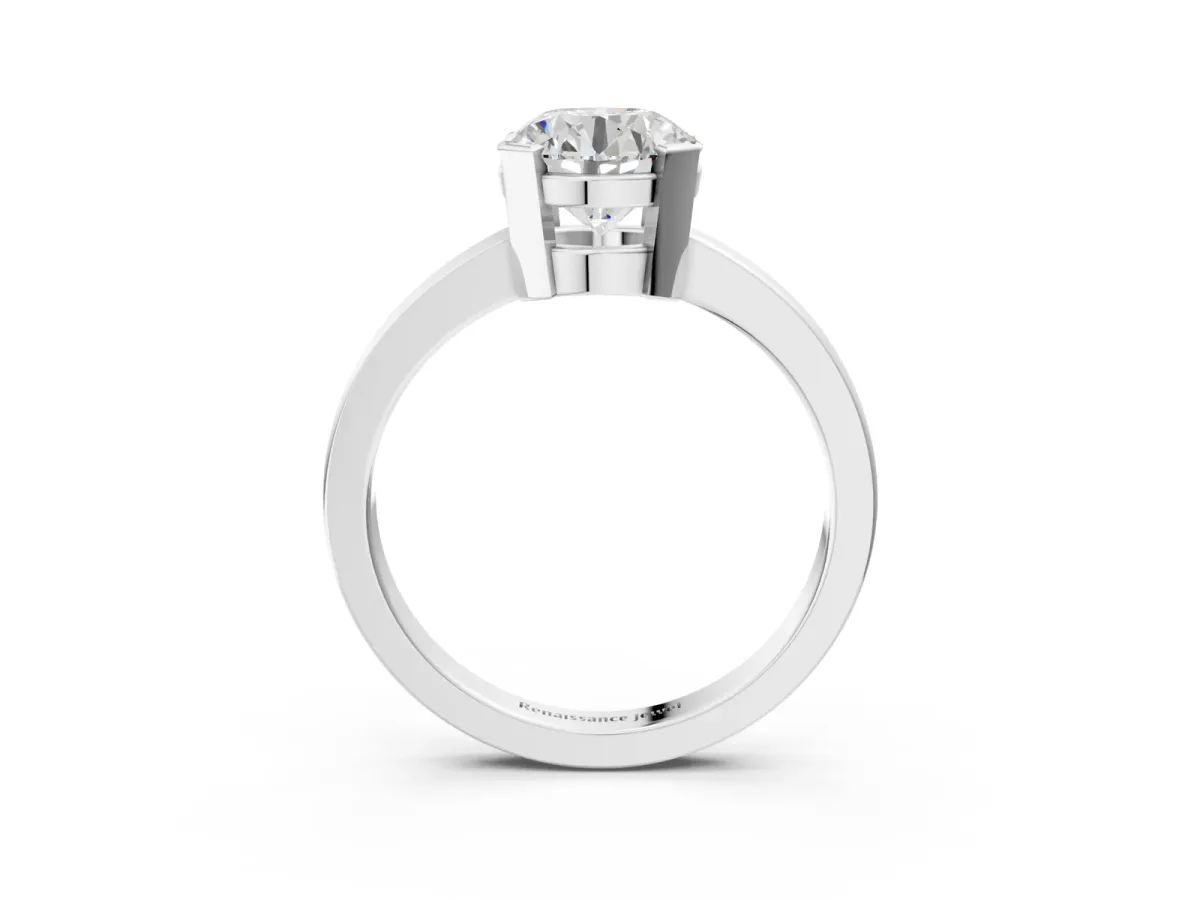 Round Cut Cut Solitaire Ring with Four-Prong Setting and Classic Band Silver