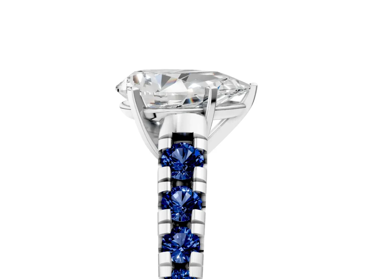 Pear Cut Diamond Cathedral Solitaire Ring with Round Blue Sapphire Pavé Band Silver