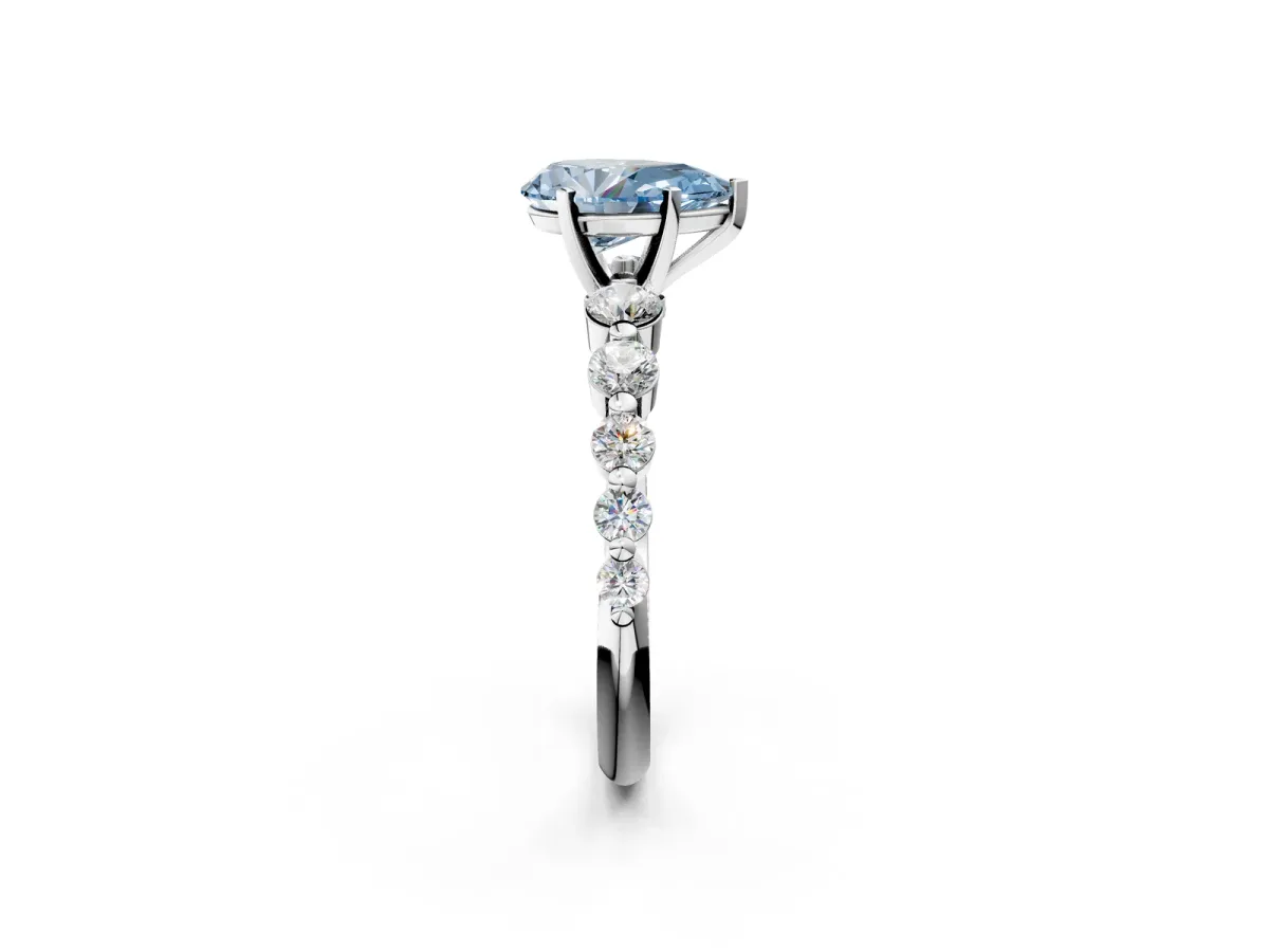 Fancy Blue Pear Cut Solitaire Diamond Ring with Pave Band and Four-Prong Setting Silver
