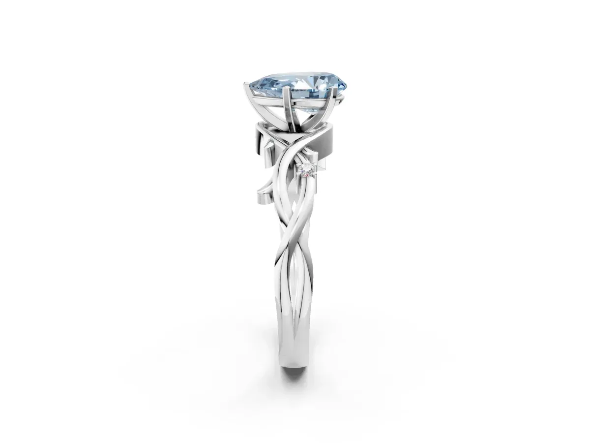 Fancy Blue Pear Cut Diamond Solitaire Ring with Twisted Band and Prong Setting White gold