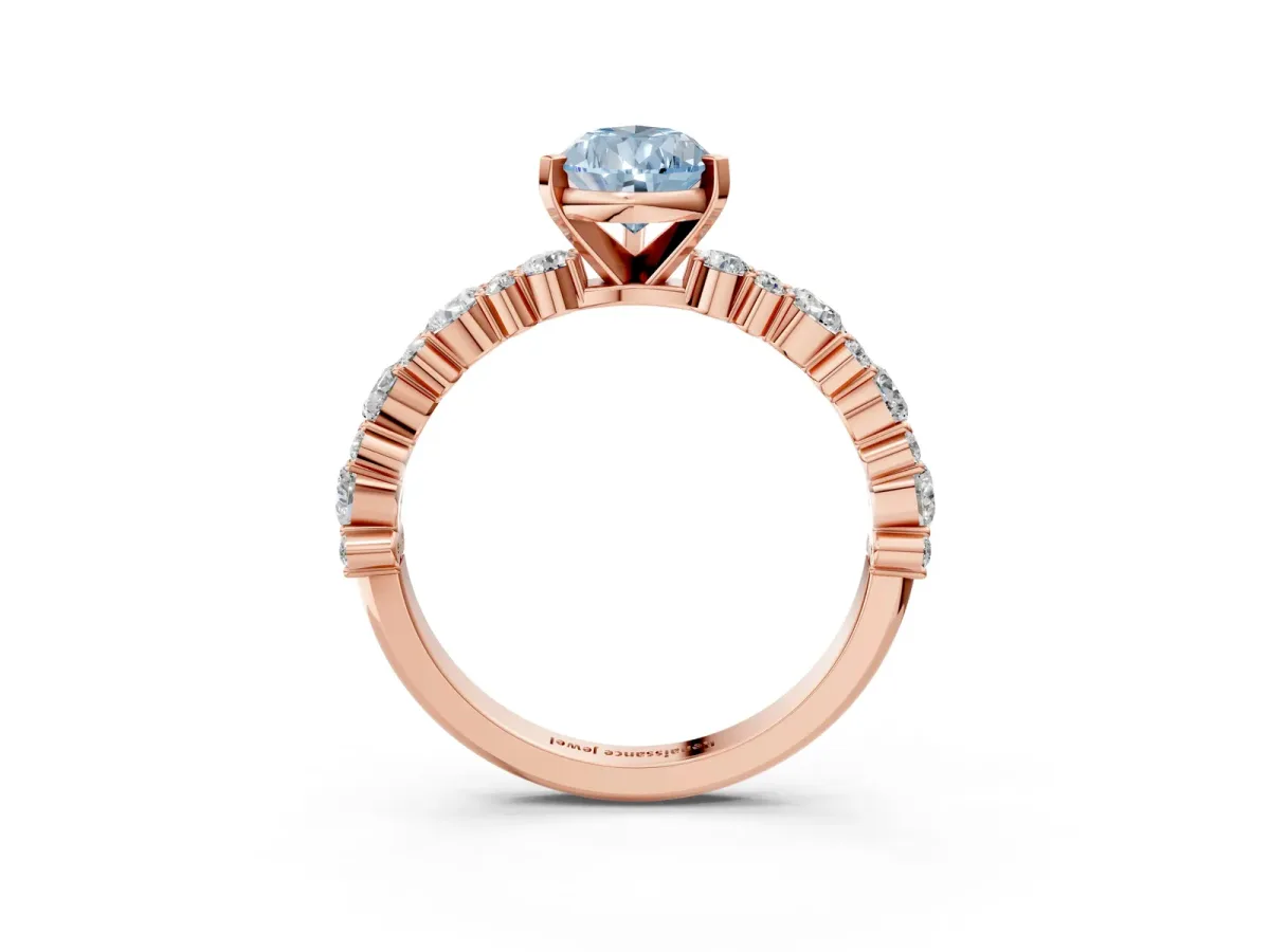 Fancy Blue Pear Cut Diamond Side Stone Solitaire Ring with Round and Four-Prong Setting Rose gold