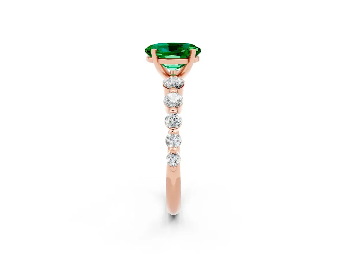 Oval Cut Solitaire Emerald Ring with Pave Band and Four-Prong Setting Rose gold