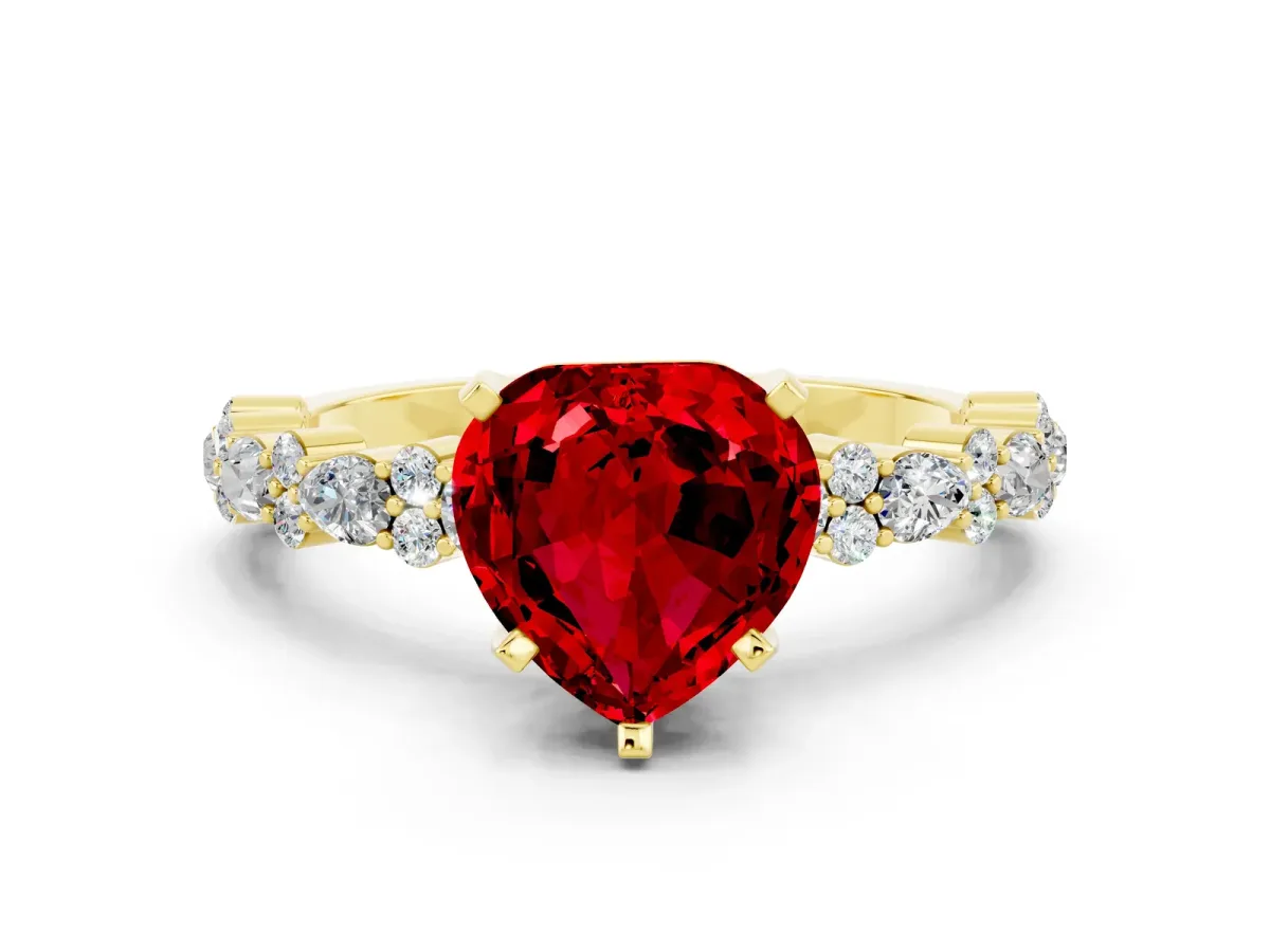 Heart Cut Ruby Side Stone Solitaire Ring with Round and Four-Prong Setting Yellow gold