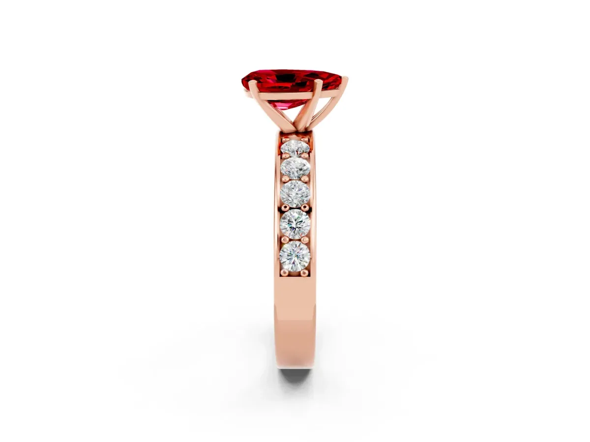 Pear Cut Ruby Engagement Ring with Channel Set Round Band and Prong Setting Rose gold