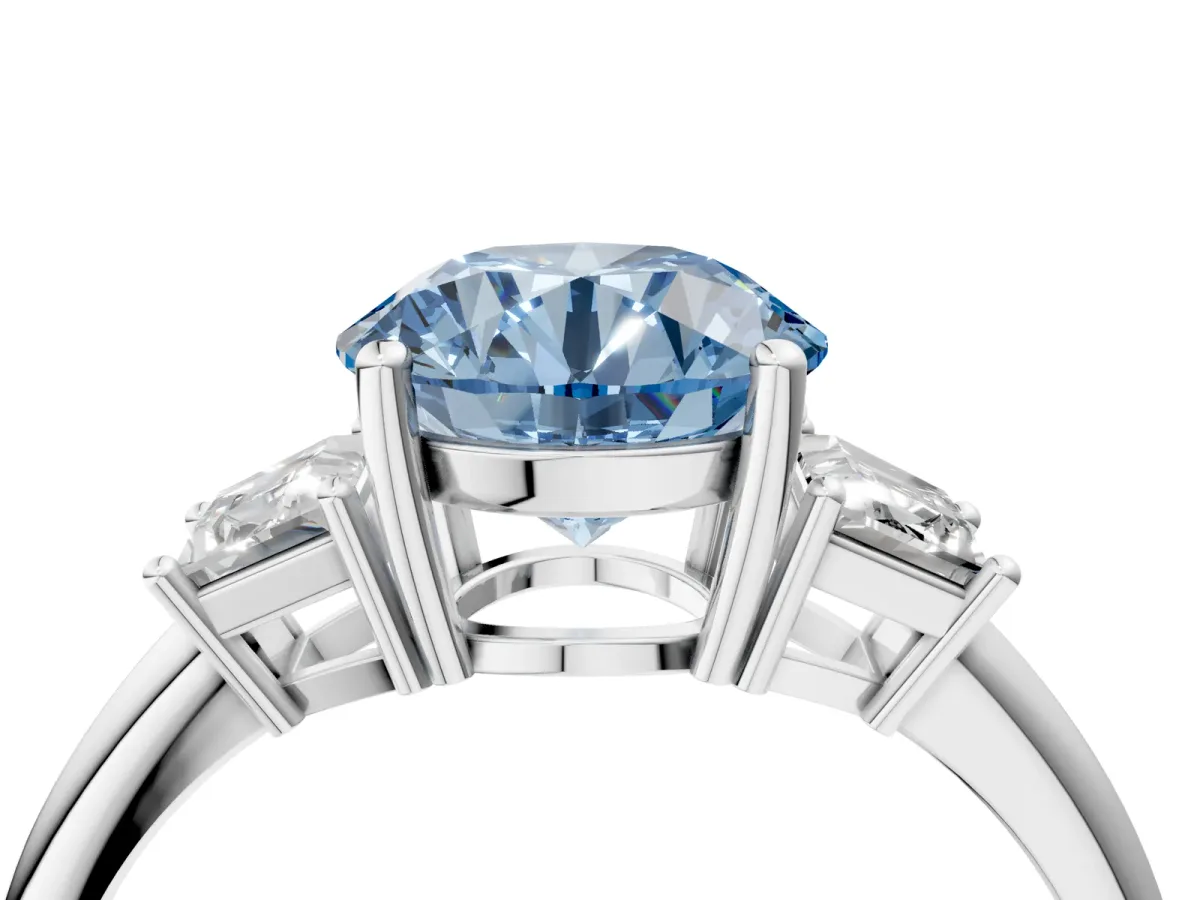 Fancy Blue Round Cut Diamond Three-Stone Ring with Trapezoid Side Stones and Prong Setting White gold