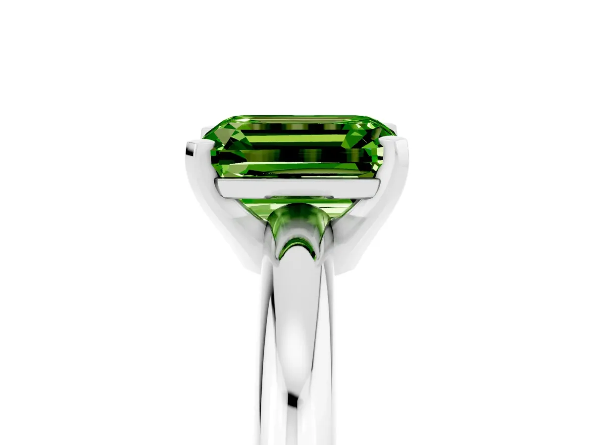 Emerald Cut Peridot Solitaire Engagement Ring with Round Band and Four-Prong Setting Silver