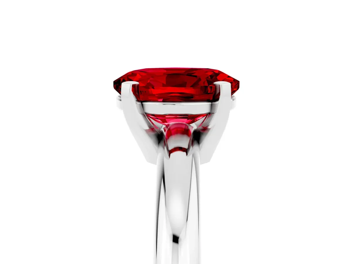Oval Cut Ruby Solitaire Engagement Ring with Round Band and Four-Prong Setting Silver