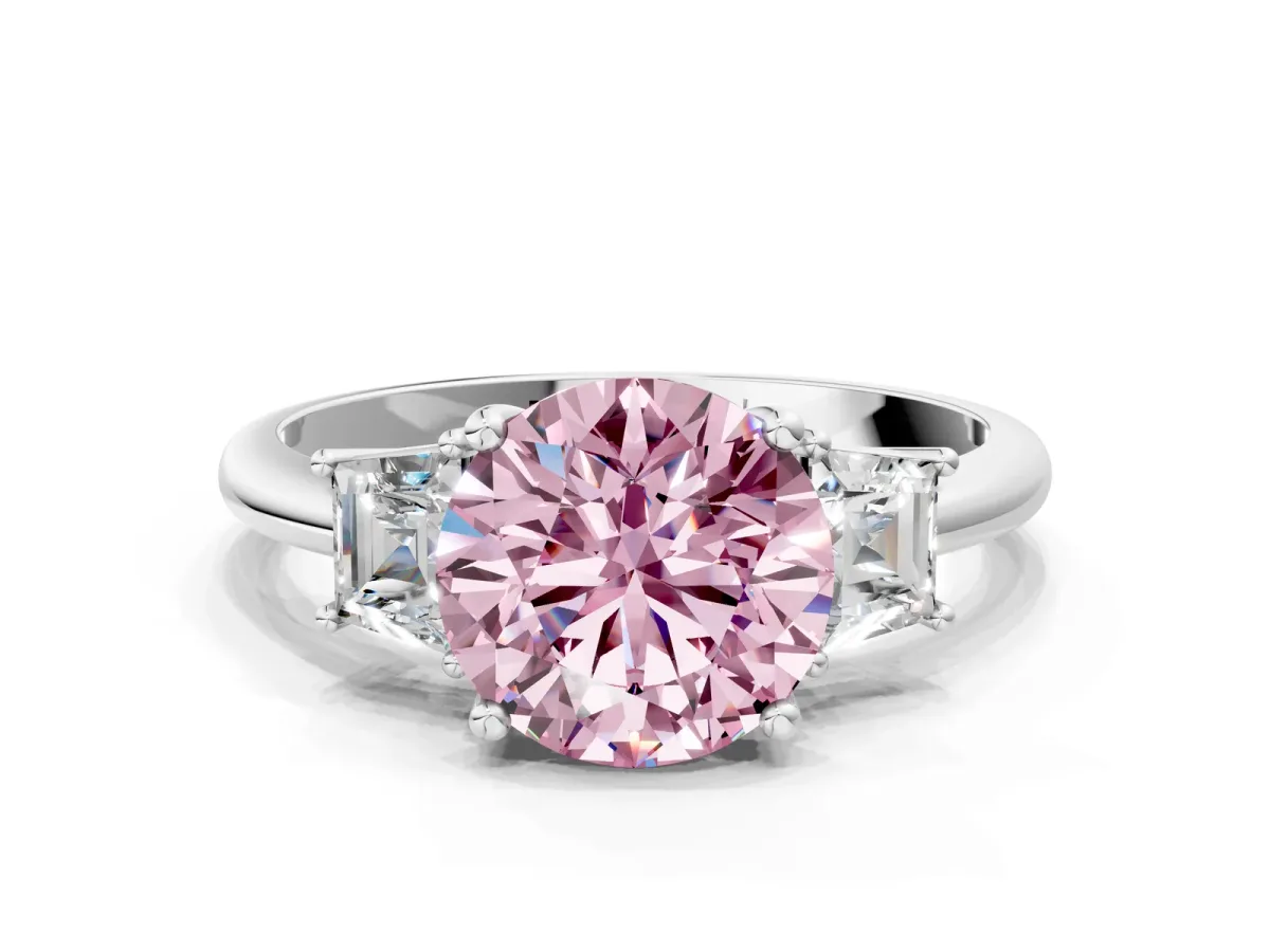 Fancy Pink Round Cut Diamond Three-Stone Ring with Trapezoid Side Stones and Prong Setting Platinum