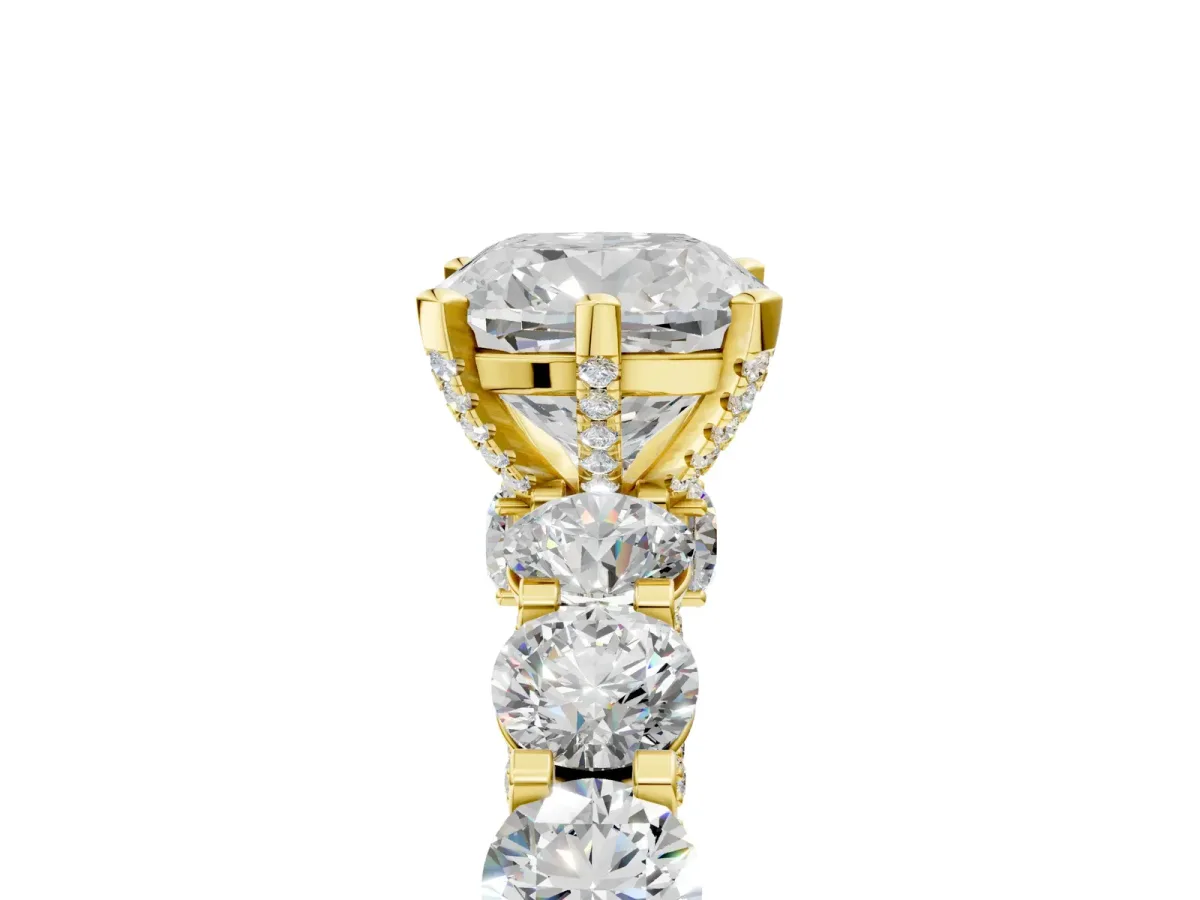 Cushion Cut Diamond Side Stone Engagement Ring with Four-Prong Setting Yellow gold