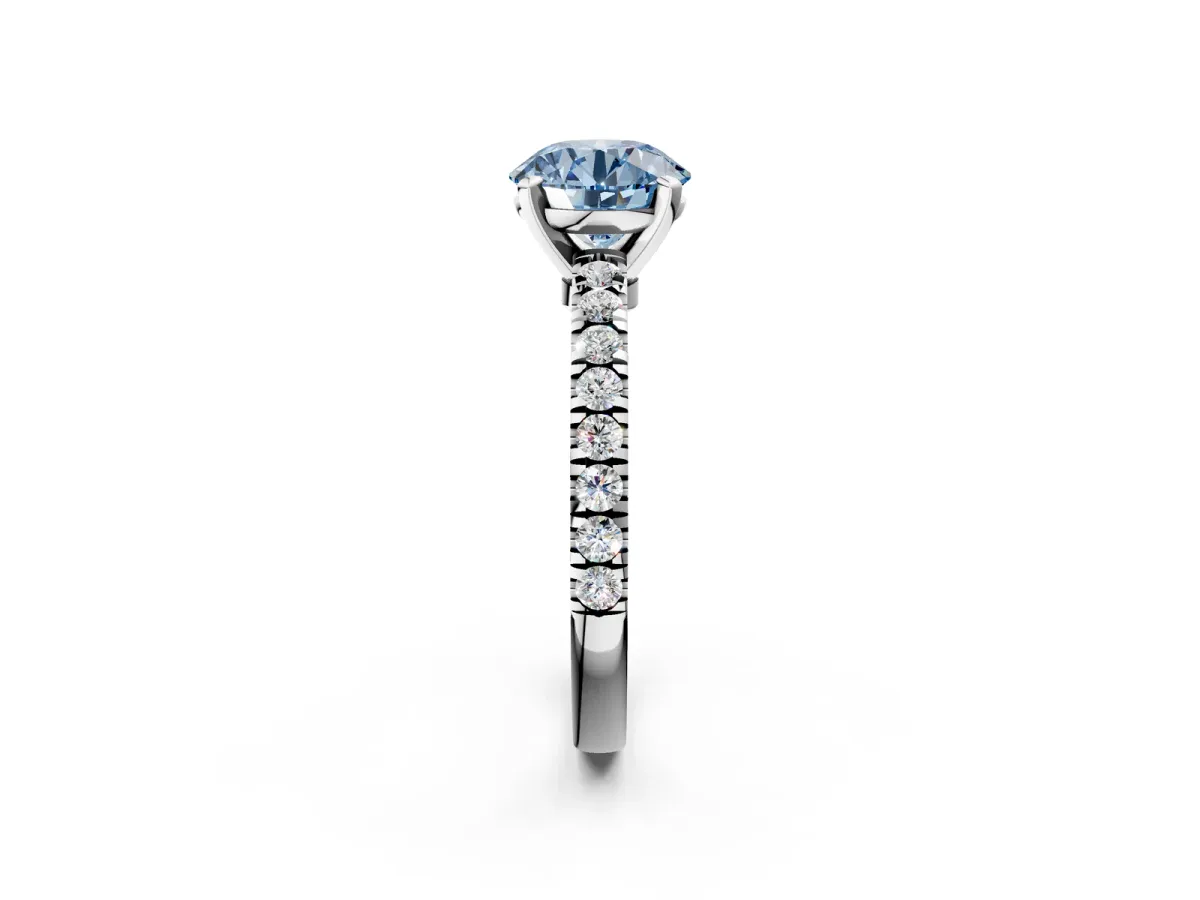 Fancy Blue Round Cut Solitaire Diamond with Pavé Band and Four-Prong Setting Silver