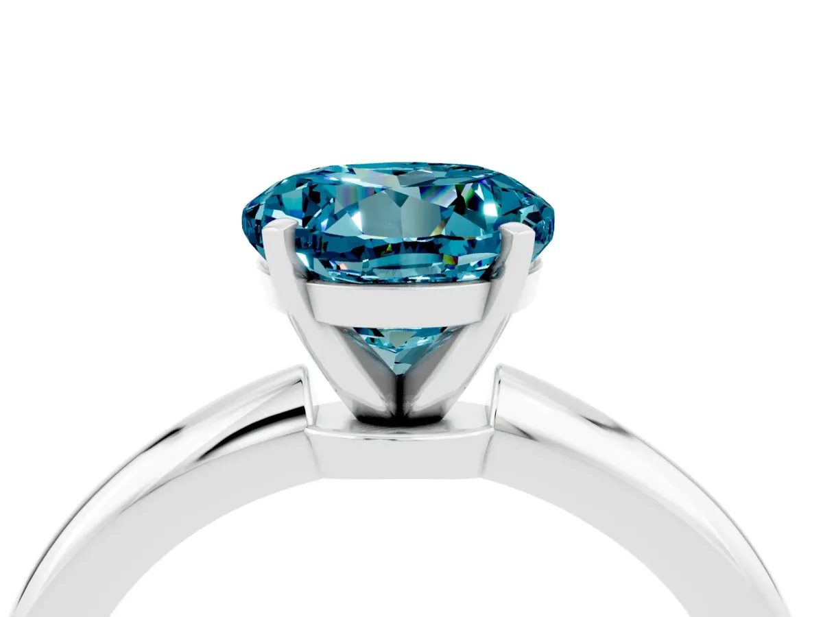 Round Cut Blue Topaz Solitaire Ring with Six-Prong Setting and Classic Band Silver