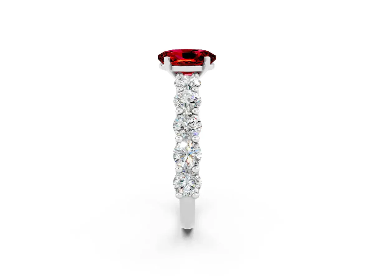 Oval Cut Ruby Prong Setting with Side Stones on a Pave Band Platinum