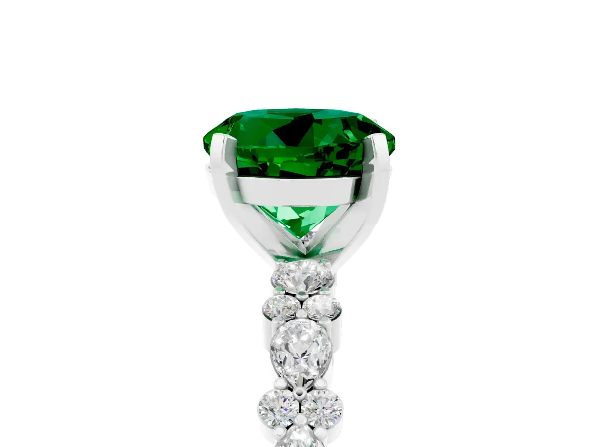 Round Cut Emerald Side Stone Solitaire Ring with Round and Four-Prong Setting Silver