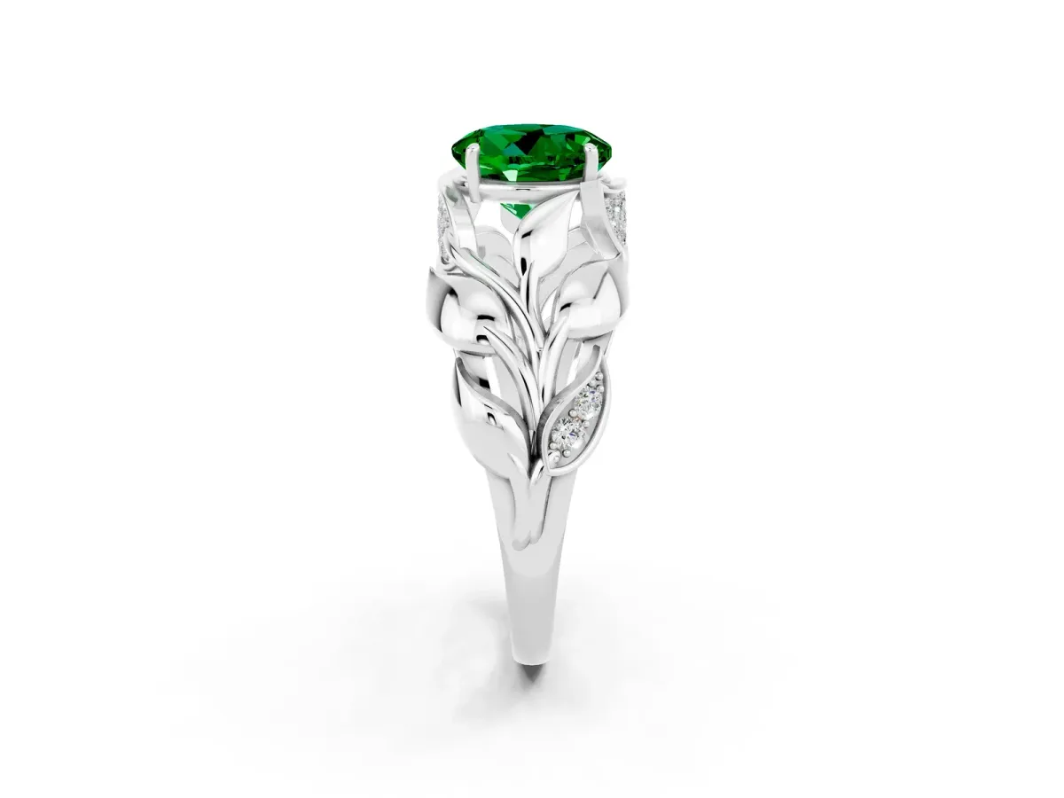 Round Cut Emerald Leaf-Inspired Engagement Ring with Round Accents and Prong Setting Silver
