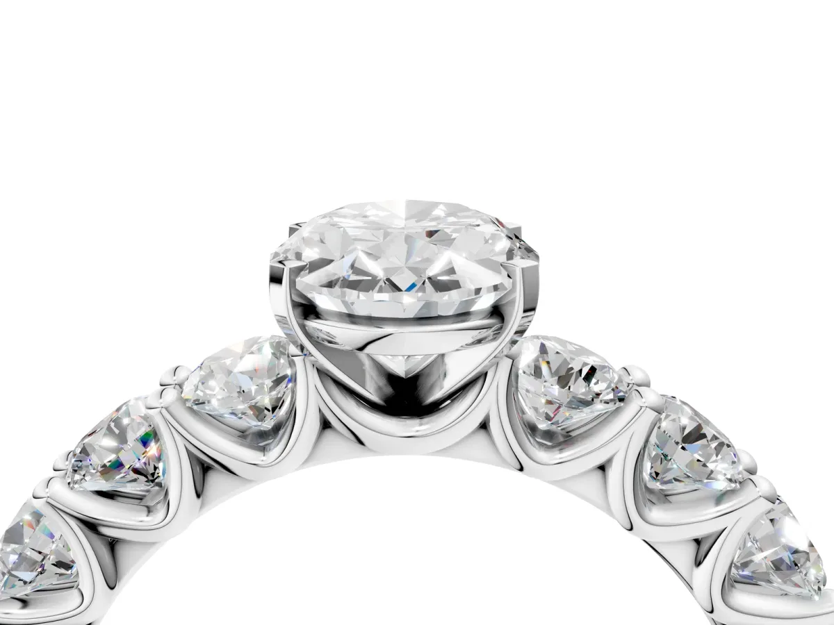 Oval Cut Diamond Prong Setting with Side Stones on a Pave Band White gold