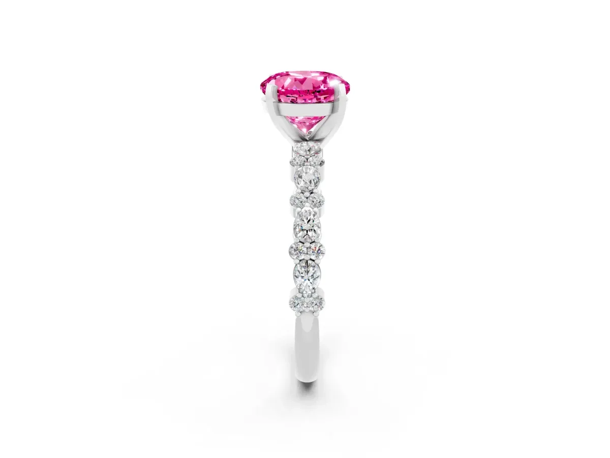 Round Cut Pink Sapphire Side Stone Solitaire Ring with Round and Four-Prong Setting Silver