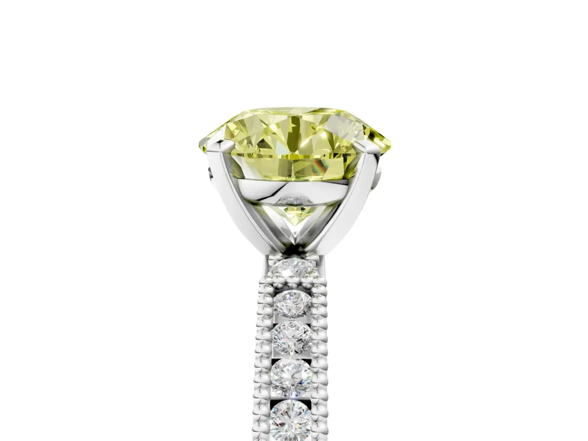 Fancy Yellow Round Cut Solitaire with Pavé Band and Four-Prong Setting Platinum