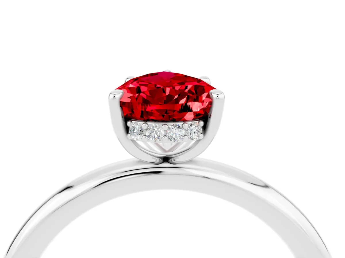 Pear Cut Ruby Solitaire Ring with Thin Band and Four-Prong Setting Silver