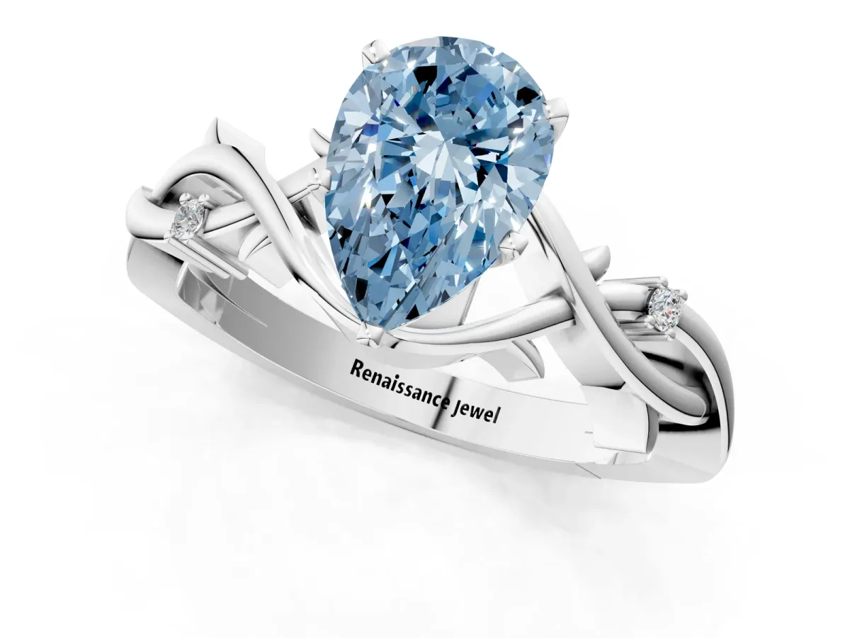 Fancy Blue Pear Cut Diamond Solitaire Ring with Twisted Band and Prong Setting White gold