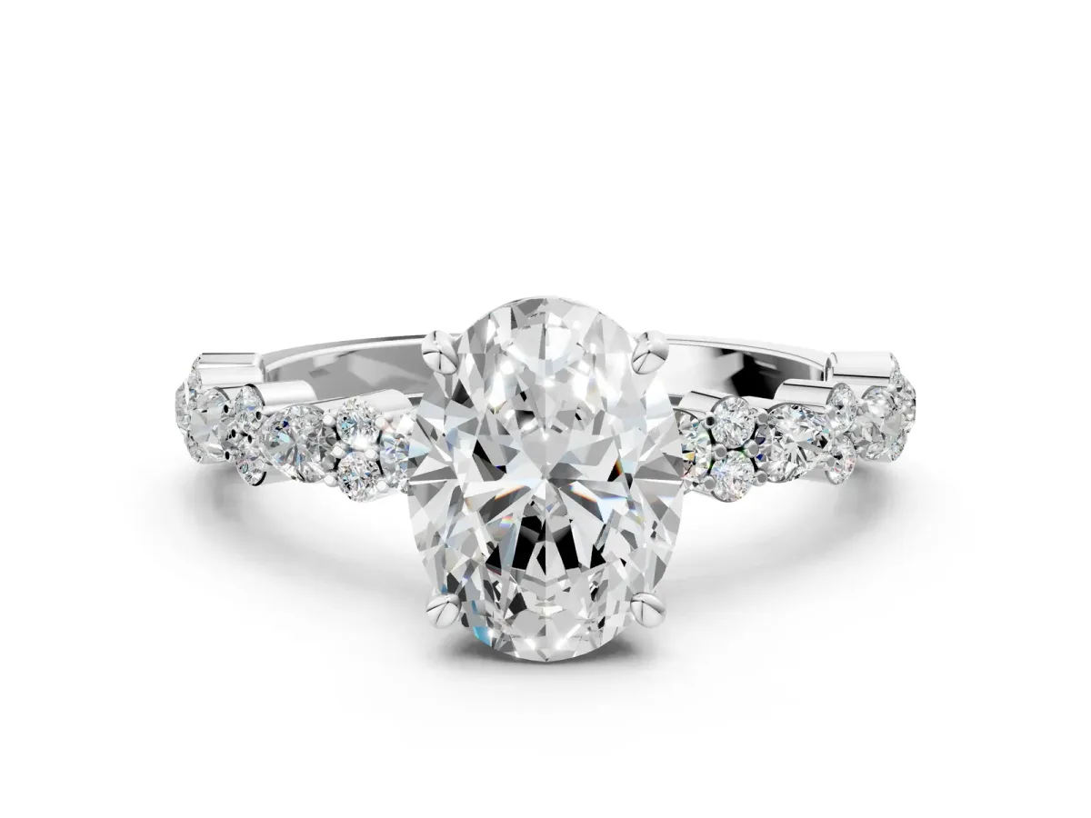 Oval Cut Diamond Side Stone Solitaire Ring with Round Moissanite and Four-Prong Setting Silver