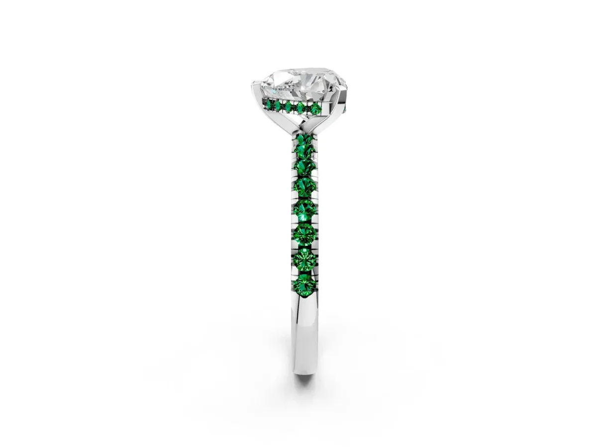 Heart Cut Diamond Solitaire Ring with Round Emerald Pavé Band and Four-Prong Setting Silver