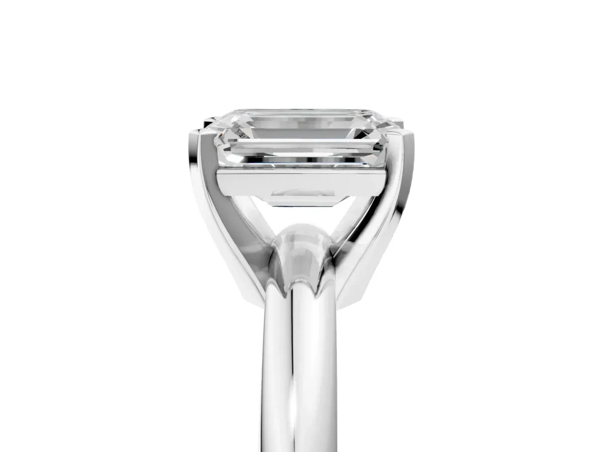 Emerald Cut Diamond Solitaire Engagement Ring with Round Band and Four-Prong Setting Silver