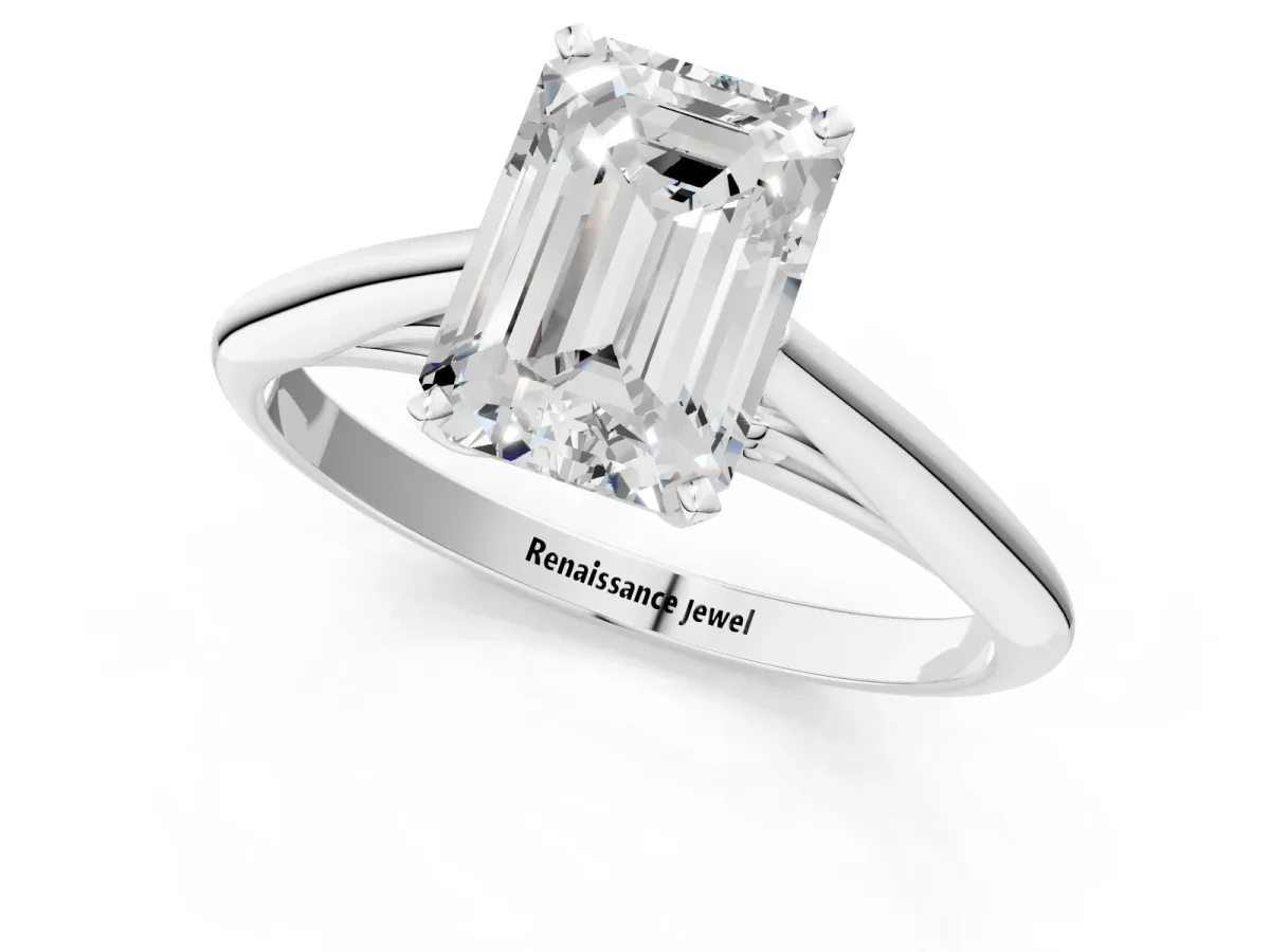 Emerald Cut Diamond Solitaire Engagement Ring with Cathedral Setting and Four-Prong Mount White gold