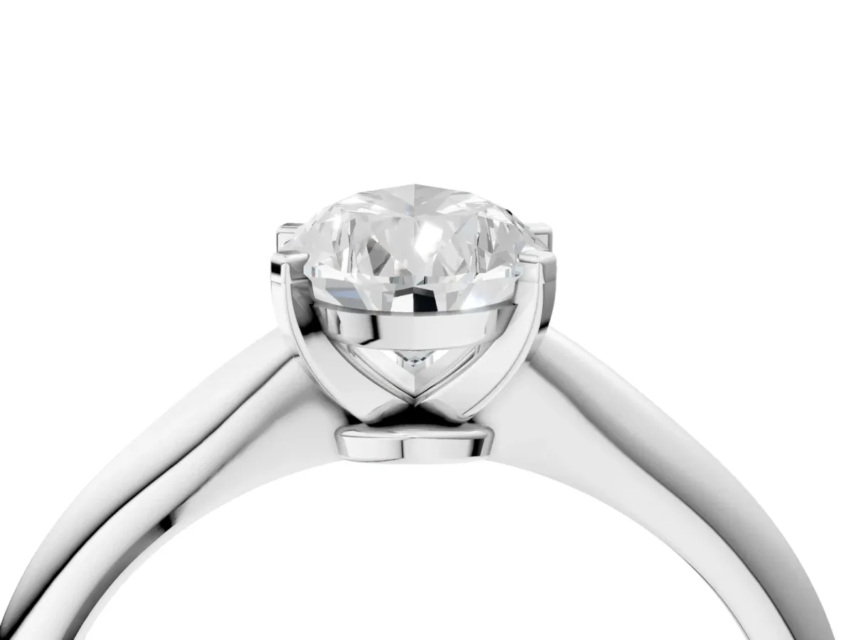 Pear Cut Diamond Solitaire Engagement Ring with Classic Band and Four-Prong Setting Silver