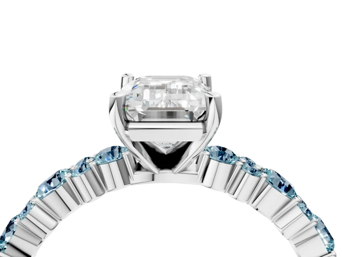Emerald Cut Diamond Side Stone Solitaire Ring with Round Aquamarine and Four-Prong Setting Silver