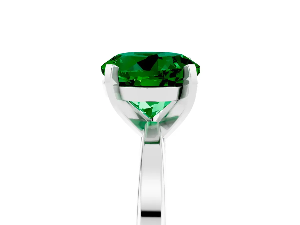 Round Cut Emerald Solitaire Engagement Ring with Classic Band and Four-Prong Setting Silver