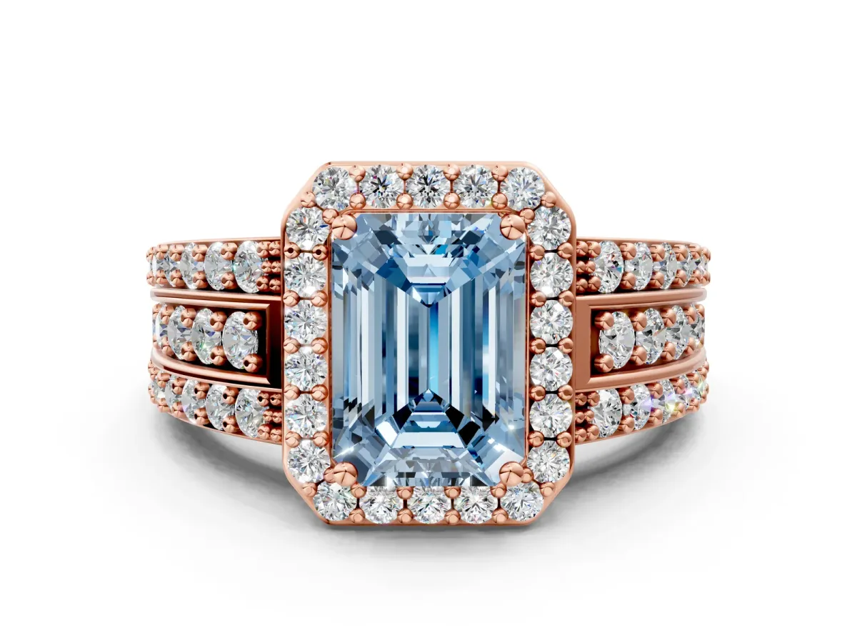Fancy Blue Emerald Cut Halo Diamond Ring with Round Split Shank and Prong Setting Rose gold