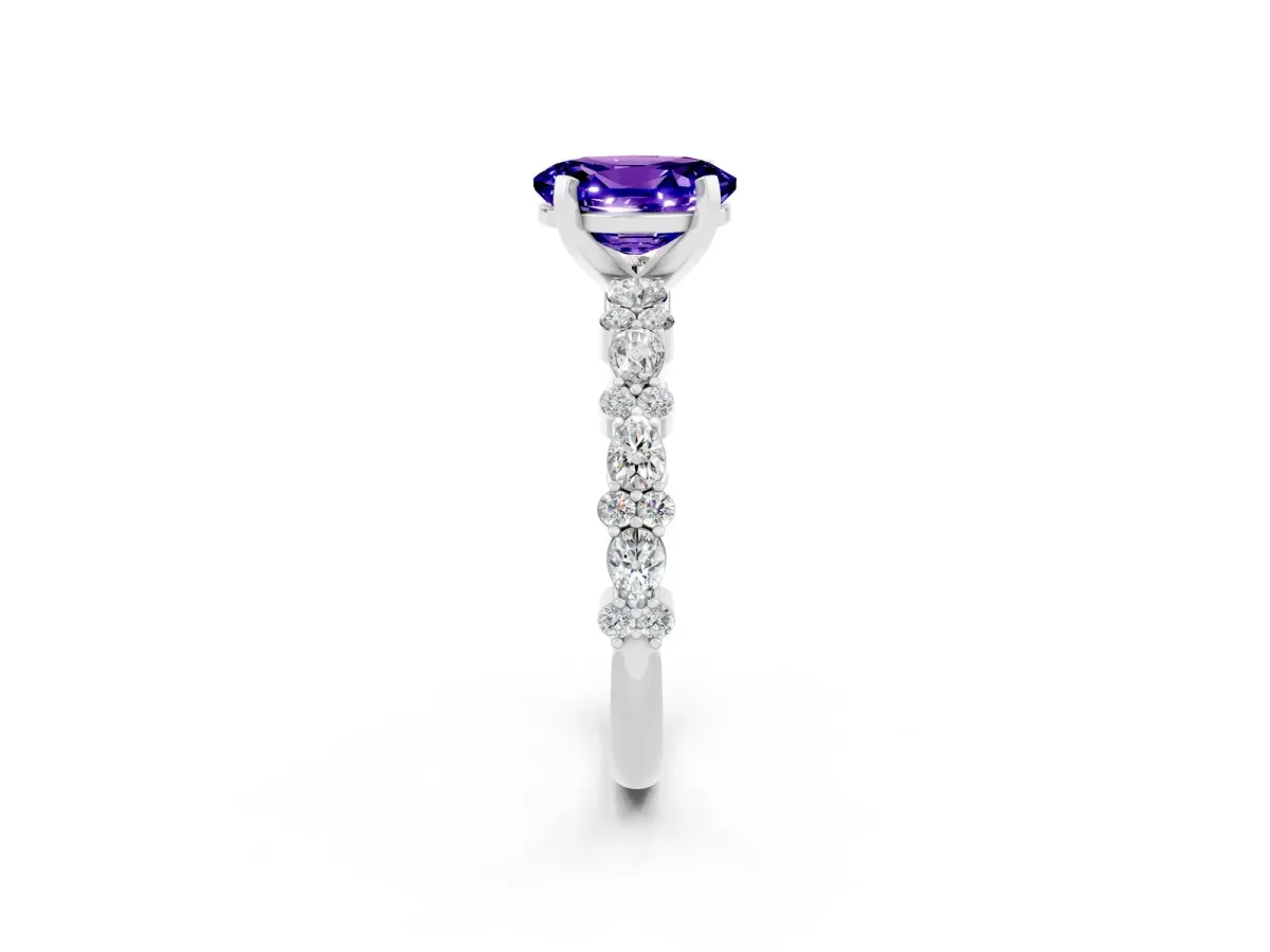Oval Cut Tanzanite Side Stone Solitaire Ring with Round and Four-Prong Setting White gold