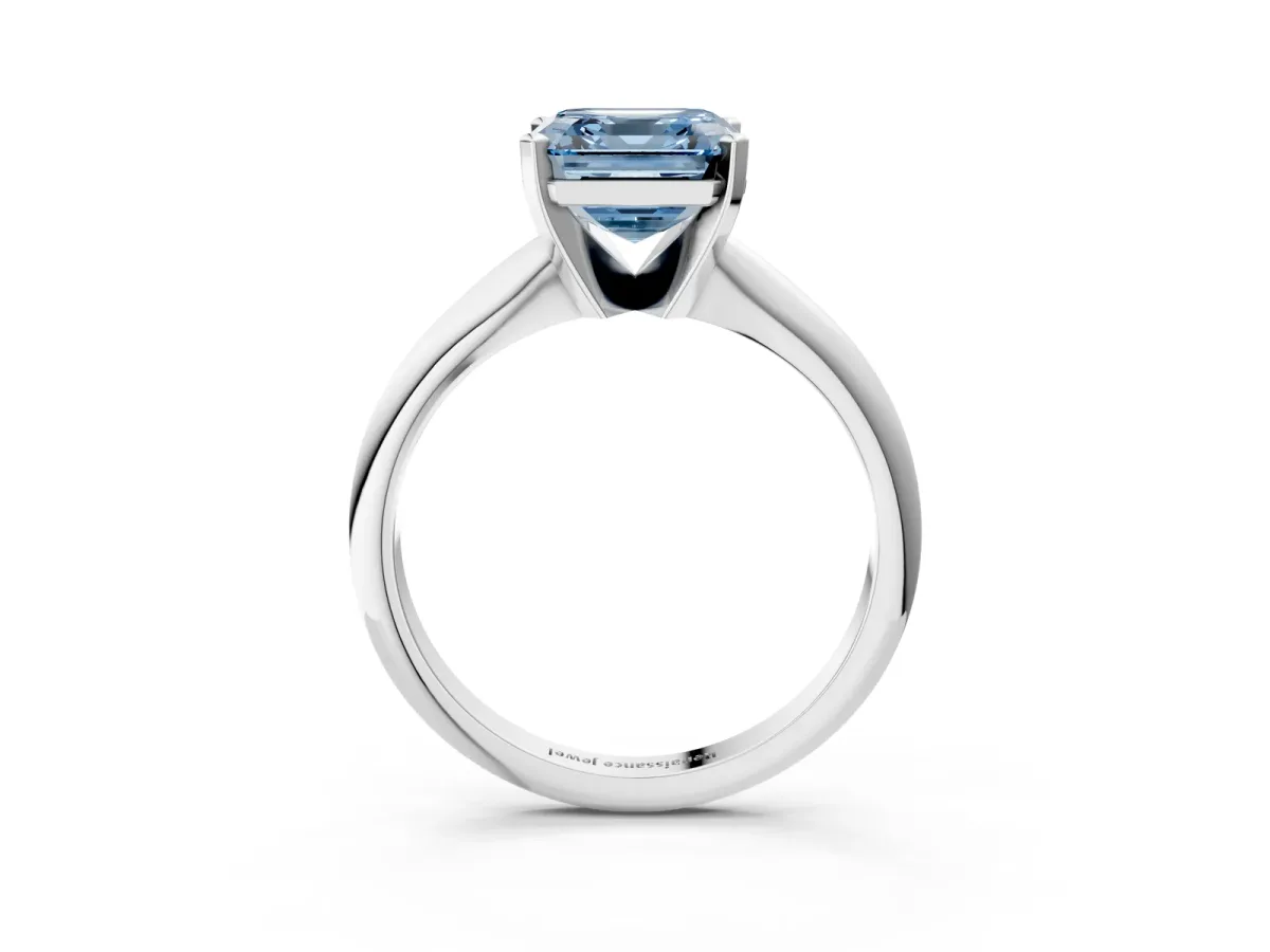 Fancy Blue Asscher Cut Cut Solitaire Ring with Four-Prong Setting on a Classic Band Platinum