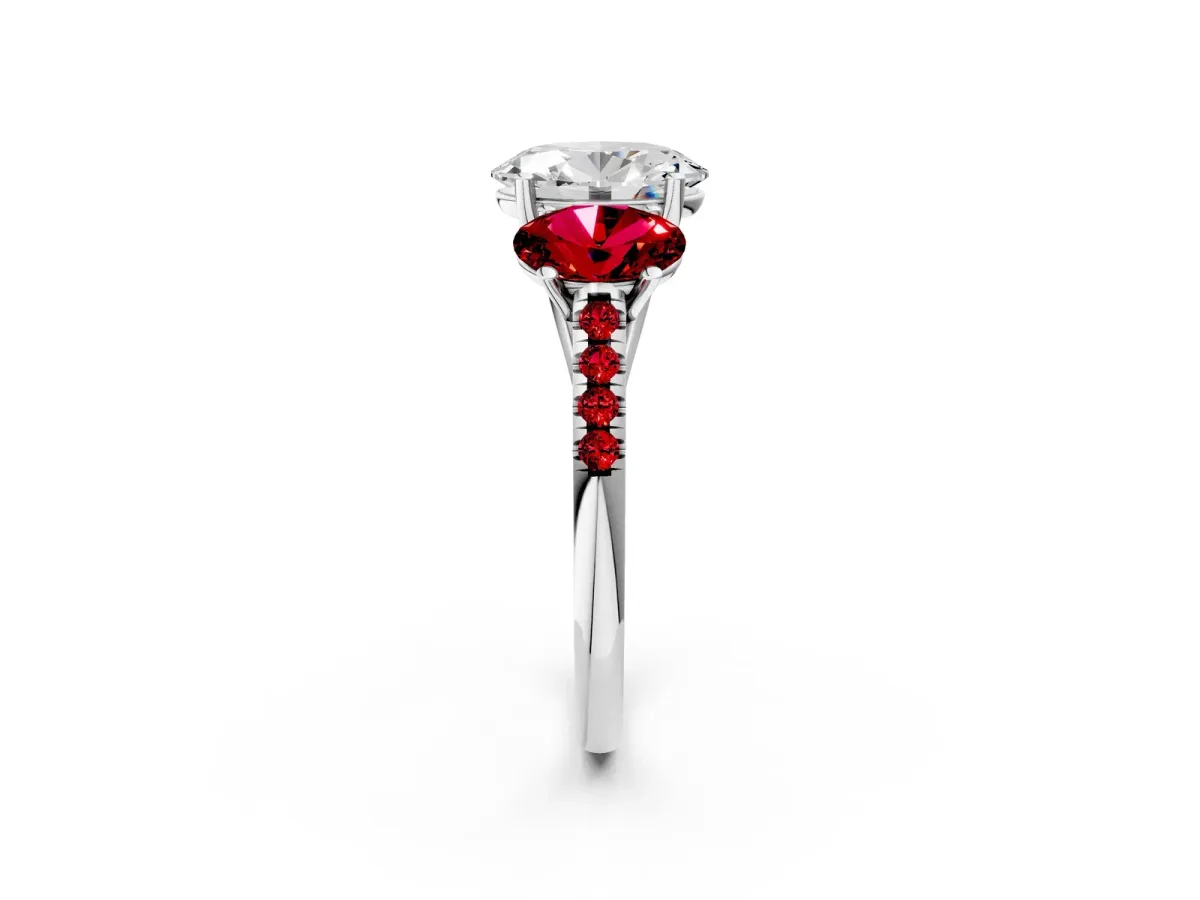 Three-Stone Oval Cut Diamond Ring with Round Ruby Pavé Band and Prong Setting Platinum